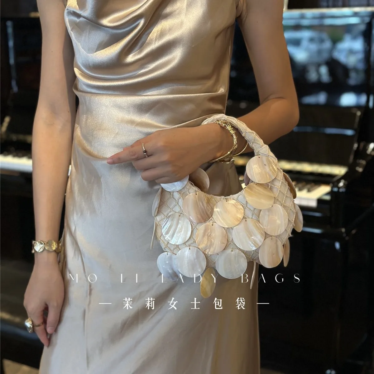 2026 high-end fairy hand-woven shell dumplings cloud fashion temperament versatile dinner single shoulder clutch bag