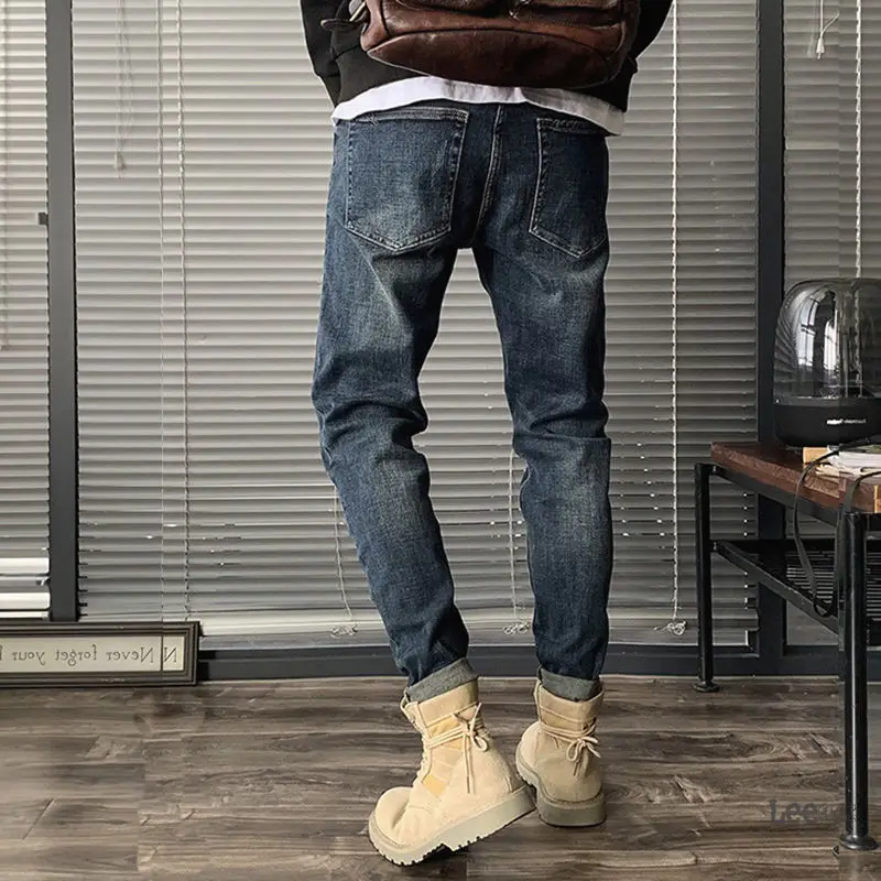 جينز ممزق للرجال خريفي جديد كوري ممزق ملابس الشارع الشهير ماركة عصرية غير رسمية سراويل طويلة زرقاء ممزقة ملابس رجالية جينز البضائع