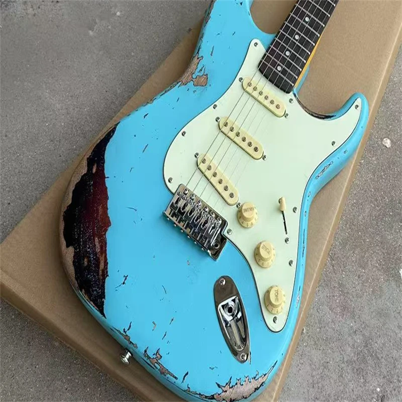 

High-quality vintage blue electric guitar, SSS pickups