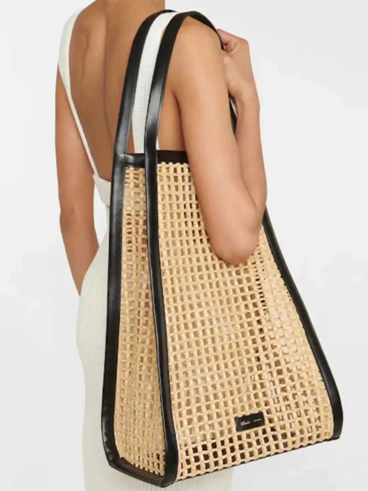 

Khaite Laffey Grass Woven Tote Bag Large Capacity Hollow Underarm Bag Single Shoulder Beach Vacation Bag European Fashion Sof...