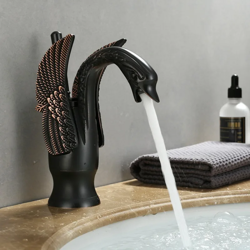Bathroom face wash basin faucet, black basin faucet, golden swan hot and cold basin faucet