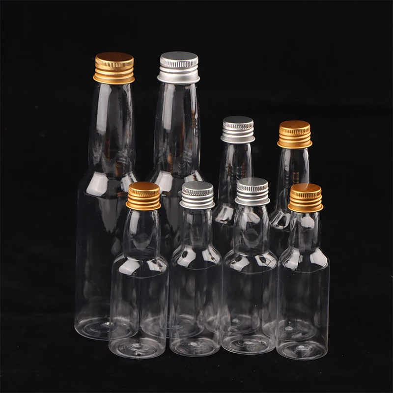 Bottiglie di spirito in plastica Mini bottiglie di liquore Mini bottiglia di colpo di alcol in plastica con tappo Bottiglia di latte Bottiglia di bevande trasparente