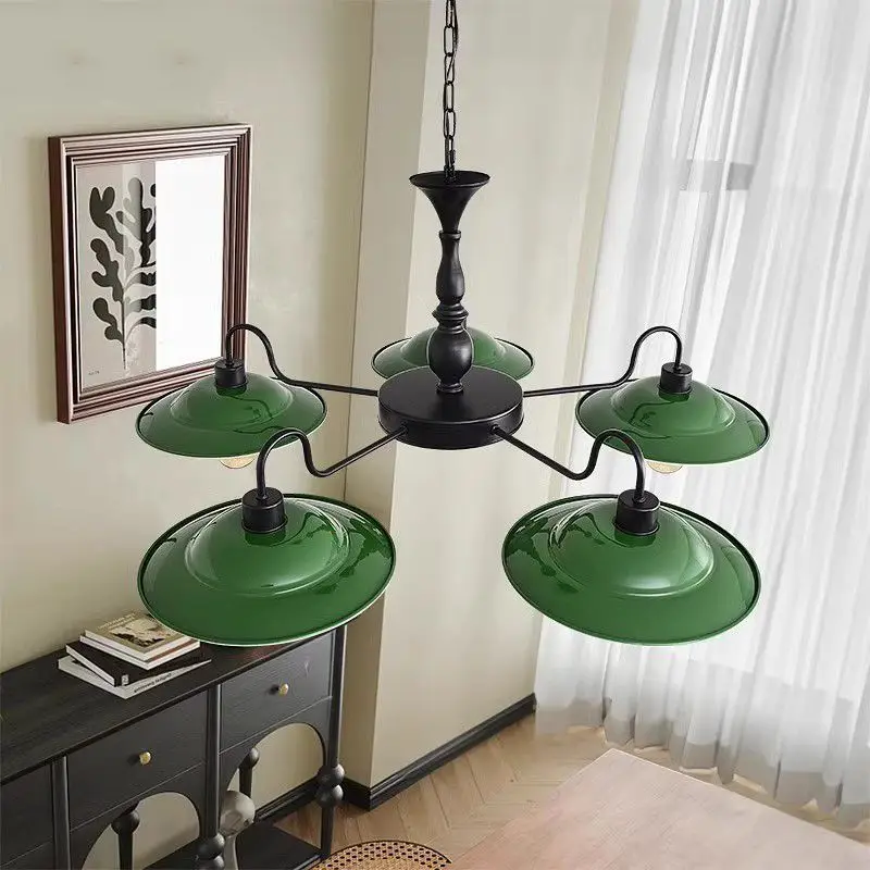 

Vintage Republican style restaurant with green wrought iron multi head chandelier