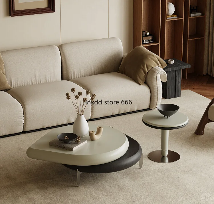 Living room light luxury designer high sense art high foot rotating coffee table