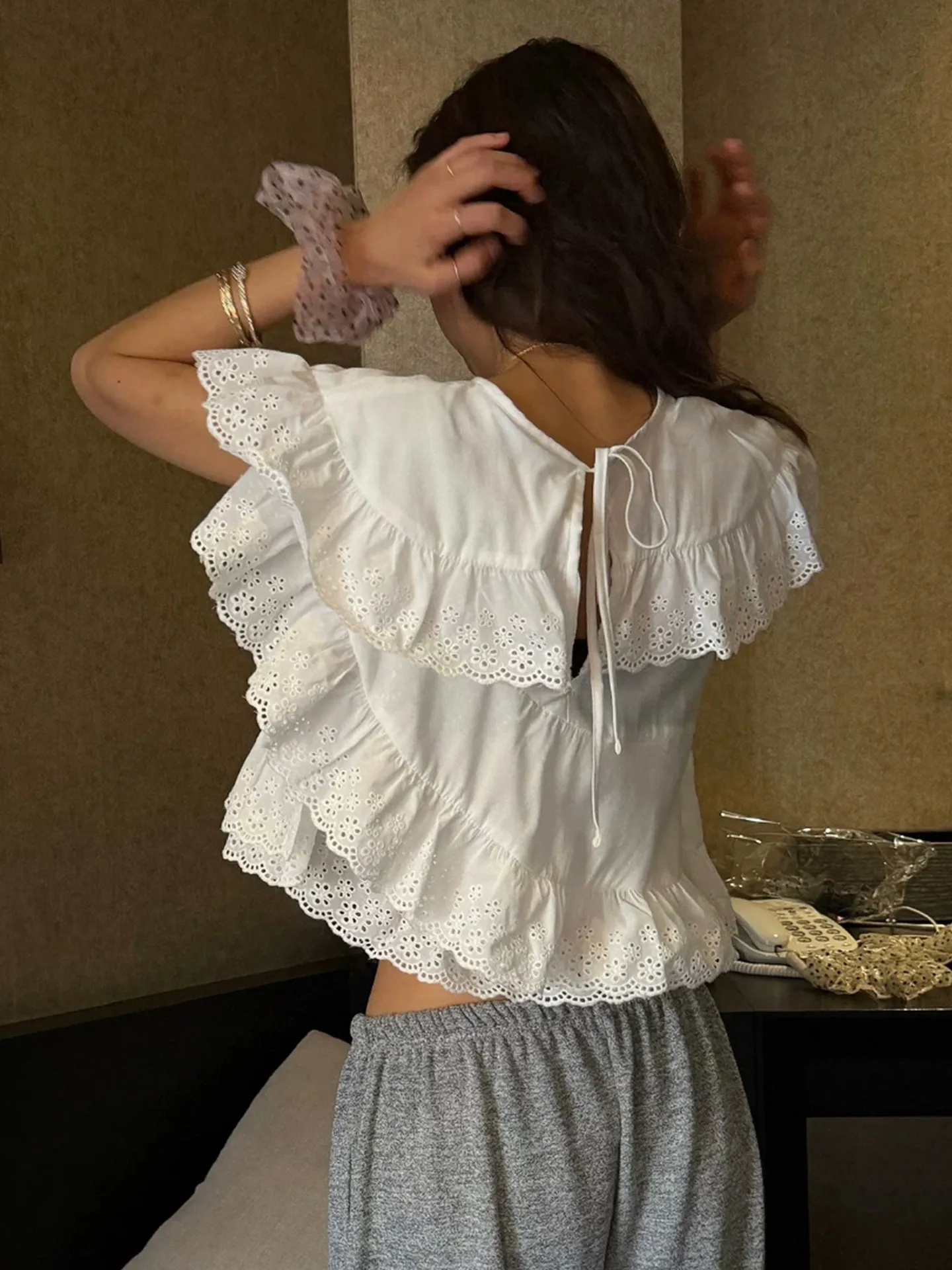 Clothland Women Sweet Lace White Black Crop Top Flying Sleeve Hollow Out Irregular Short Blouse Shirt WA461