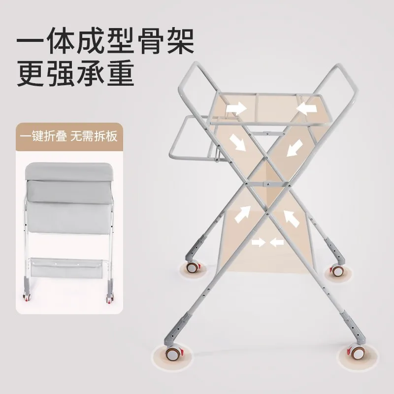 The new multifunctional folding high and low can adjust the newborn baby care table, changing diaper table, bathing table