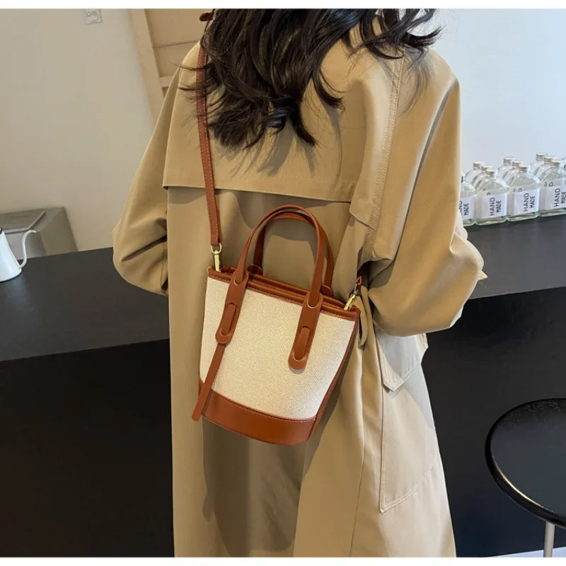 

Texture niche canvas hit color small bucket bag bag female 2025 new mini crossbody bag fashion leisure shoulder bags