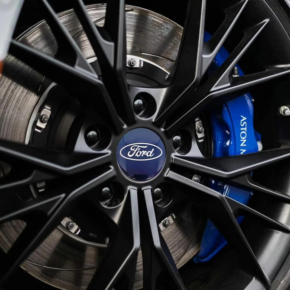 4 X 54MM Decorazioni per auto Tappi centrali Kit tappo ruota centrale blu per Ford La maggior parte dei modelli Focus Fiesta Ka Kuga