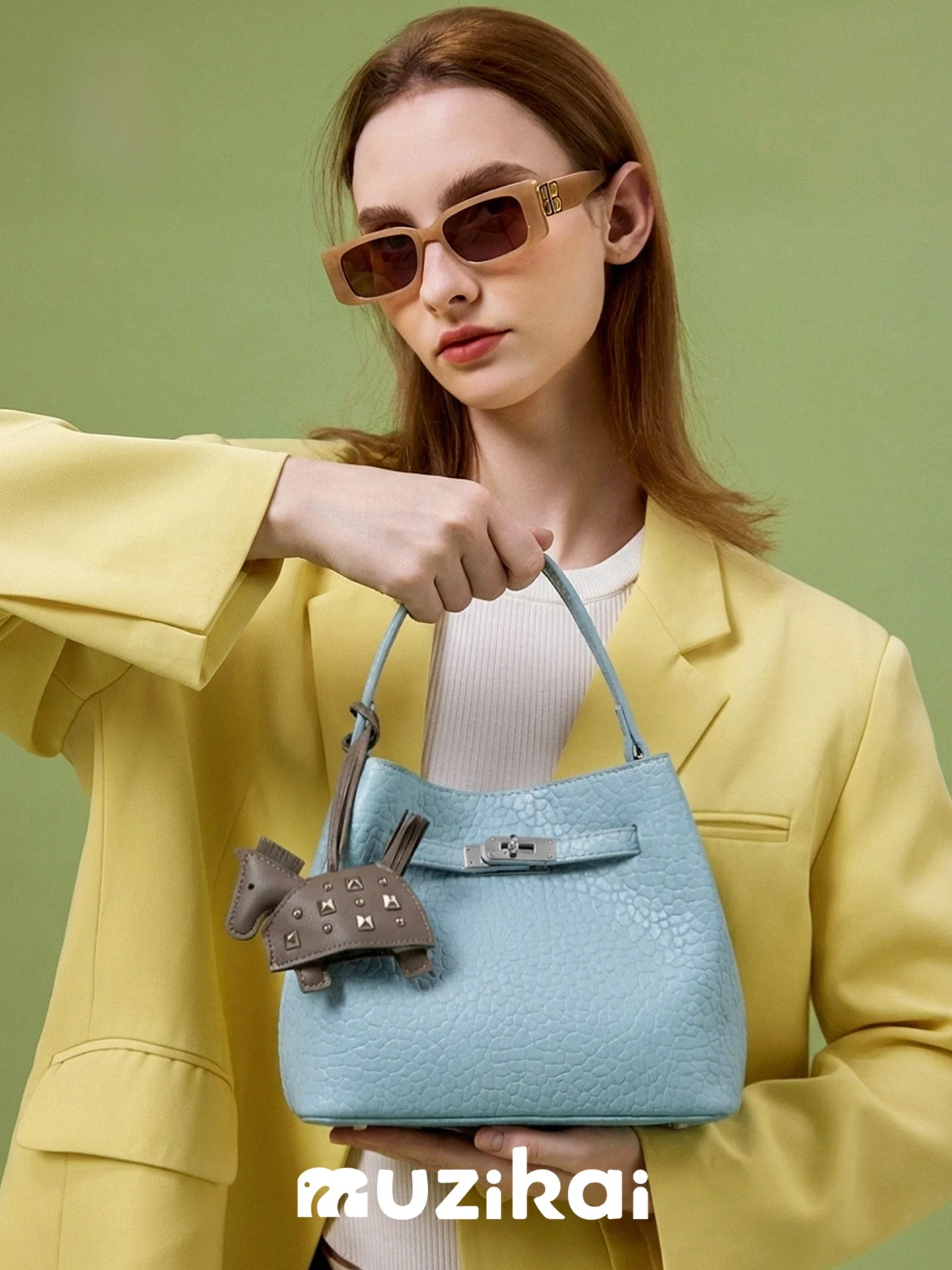 

Fashionable Minimalist Bucket Handbag Women's New 2026 Exotic High-End Lychee Pattern Crossbody Bag MuziKai Handbag
