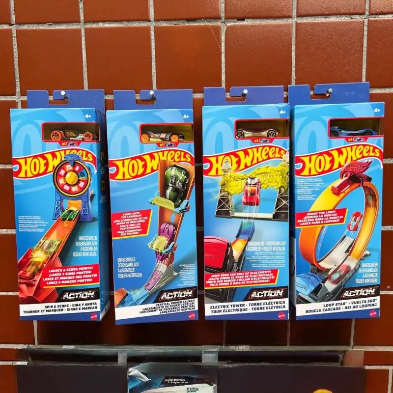 

Игровой набор Hot Wheels FWM85: трасса для машинок с пусковым устройством, вертикальным трюком 360° и электрической башней-спиннером для мальчиков