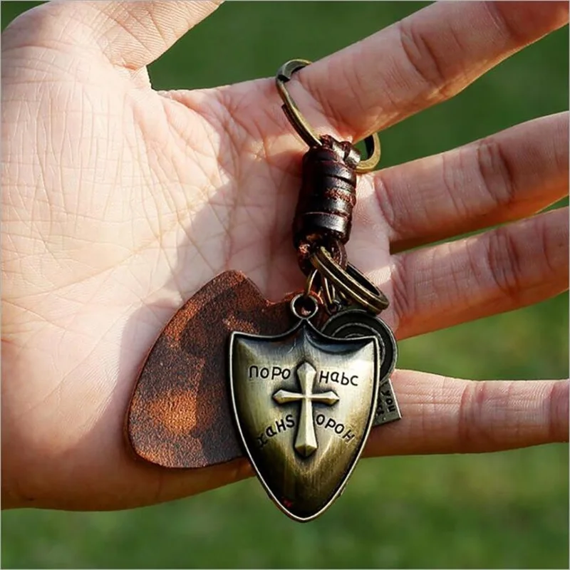 

Cross Shield Alloy Keychain Retro Woven Leather Keychain Pendant Wild DIY Clothing Accessories Men's and Women's Jewelry