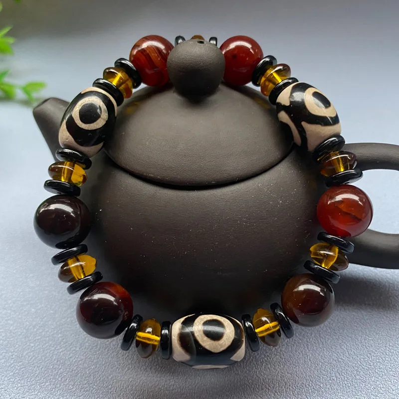 

Tibetan agate three-eyed dzi bead bracelet with single ring bracelet red black hand row for men and women will sell jade.