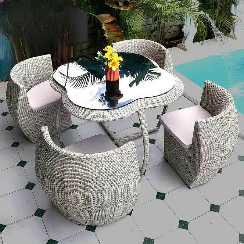 Outdoor villa courtyard storage table and chair garden terrace rattan chair hotel homestay one table four chairs five-piece furn