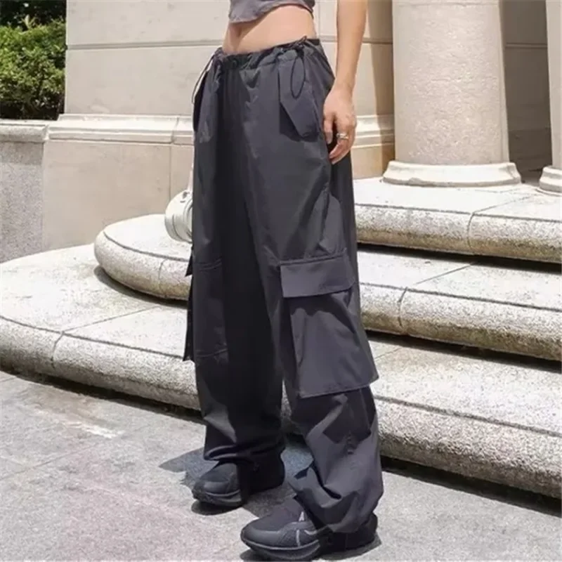 

Leisure Street Shooting Trendy Workwear Pants with High Waist Loose Three Dimensional Pocket Design Tie Feet Two Wear Guards