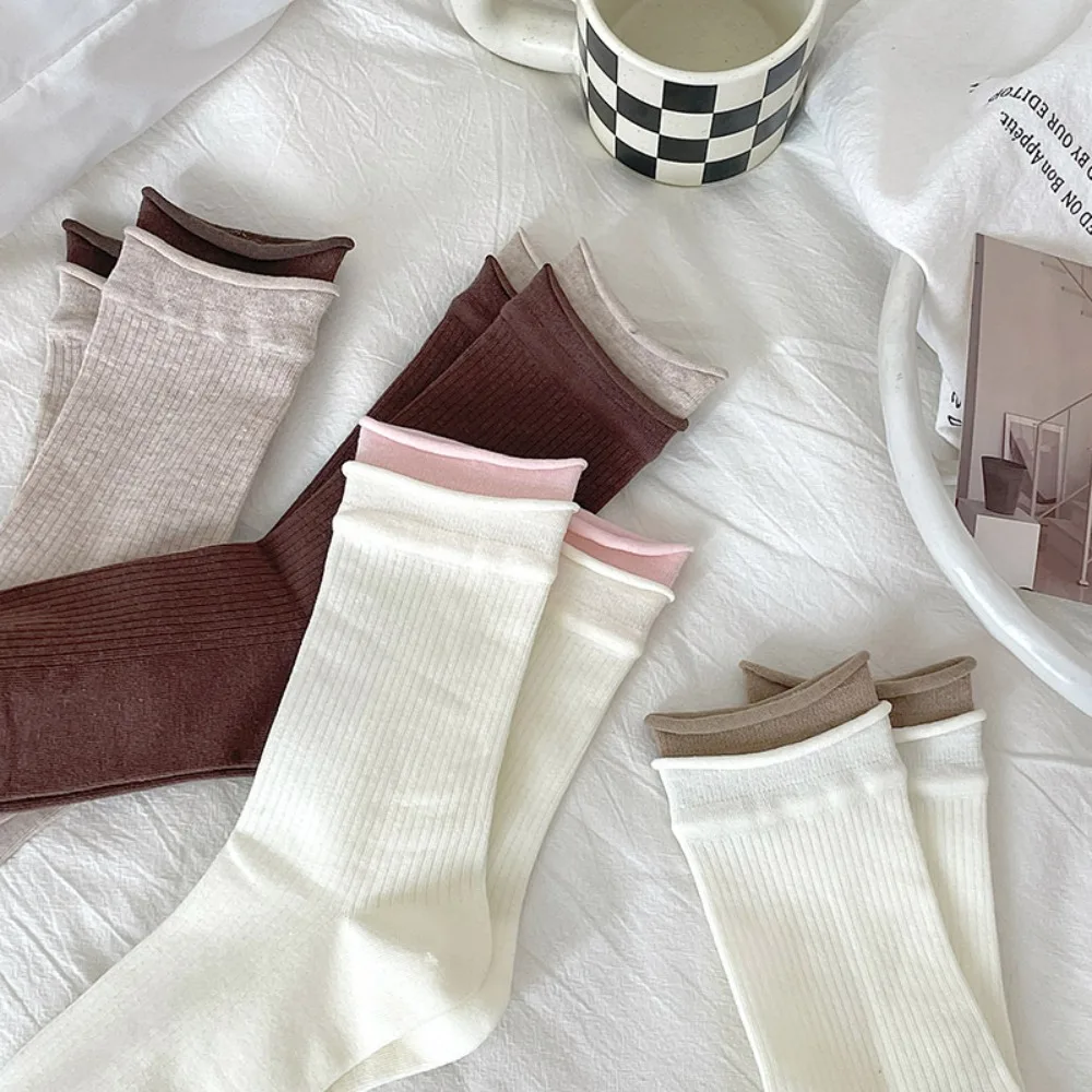 新しい保温ベルベット靴下肥厚ソフトミッドチューブ靴下綿二ネジタイプの女性の靴下冬
