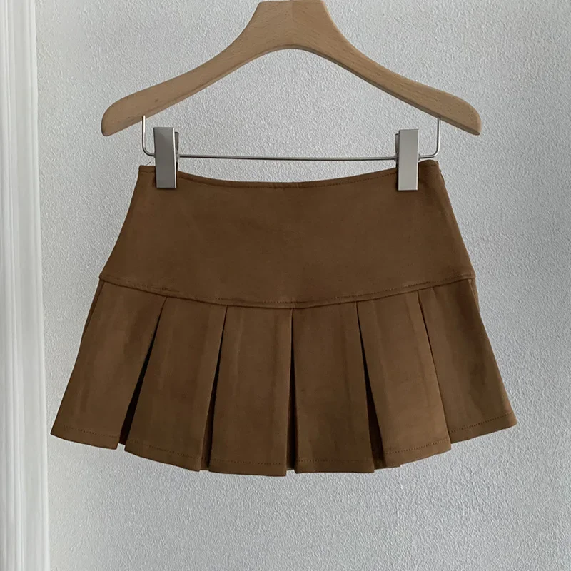 Oumale لون نقي من جلد الغزال تنورة صغيرة المرأة الخريف جديد الكورية نمط التخسيس مكافحة الضوء مطوي تنورة قصيرة ألف خط
