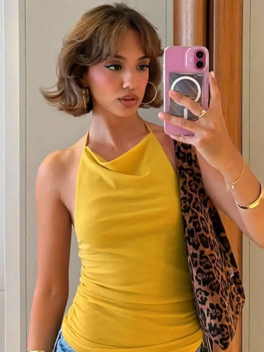 セクシーな背中の開いたメッシュトップ女性の Tシャツピュアカラー春夏ファッショナブルなノースリーブショート丈パッチワークデザインポリエステル生地