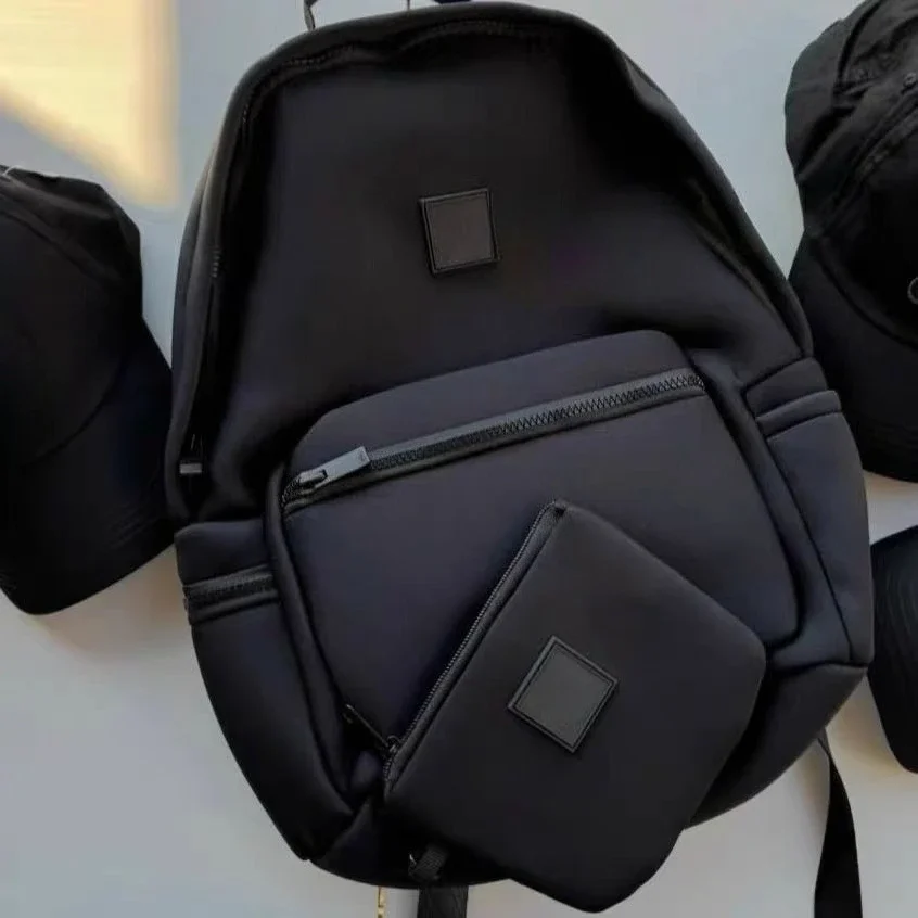 

Unisex Large-capacity Backpack Water-Resistant Matte Neoprene Solid Color Casual Travel Backpack for School and Commuting