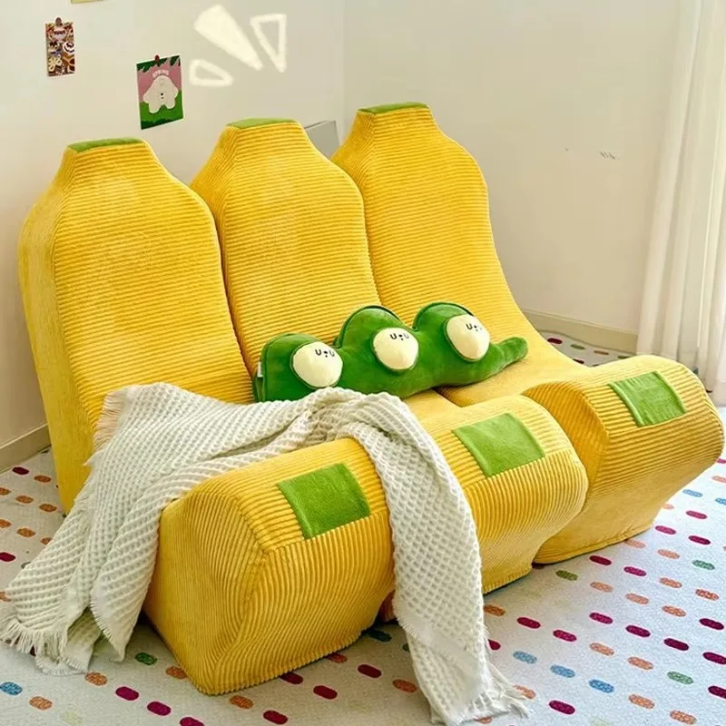 Vacuum compressed banana lazy sofa modular segmented modern retro corduroy fabric sofa space saving hotel living room view 2