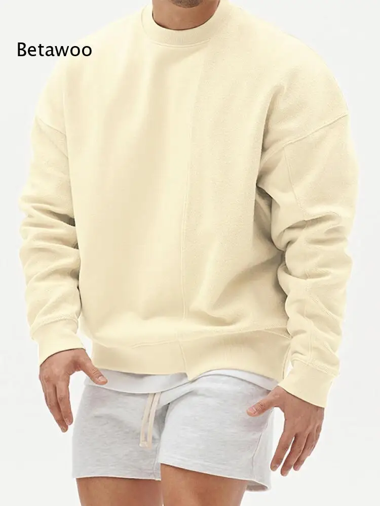Autumn Men Solid Color Crew Neck Pullover Sweatshirt Seam Splice Design Long Sleeve Loose Fit Top For Daily Casual Activities