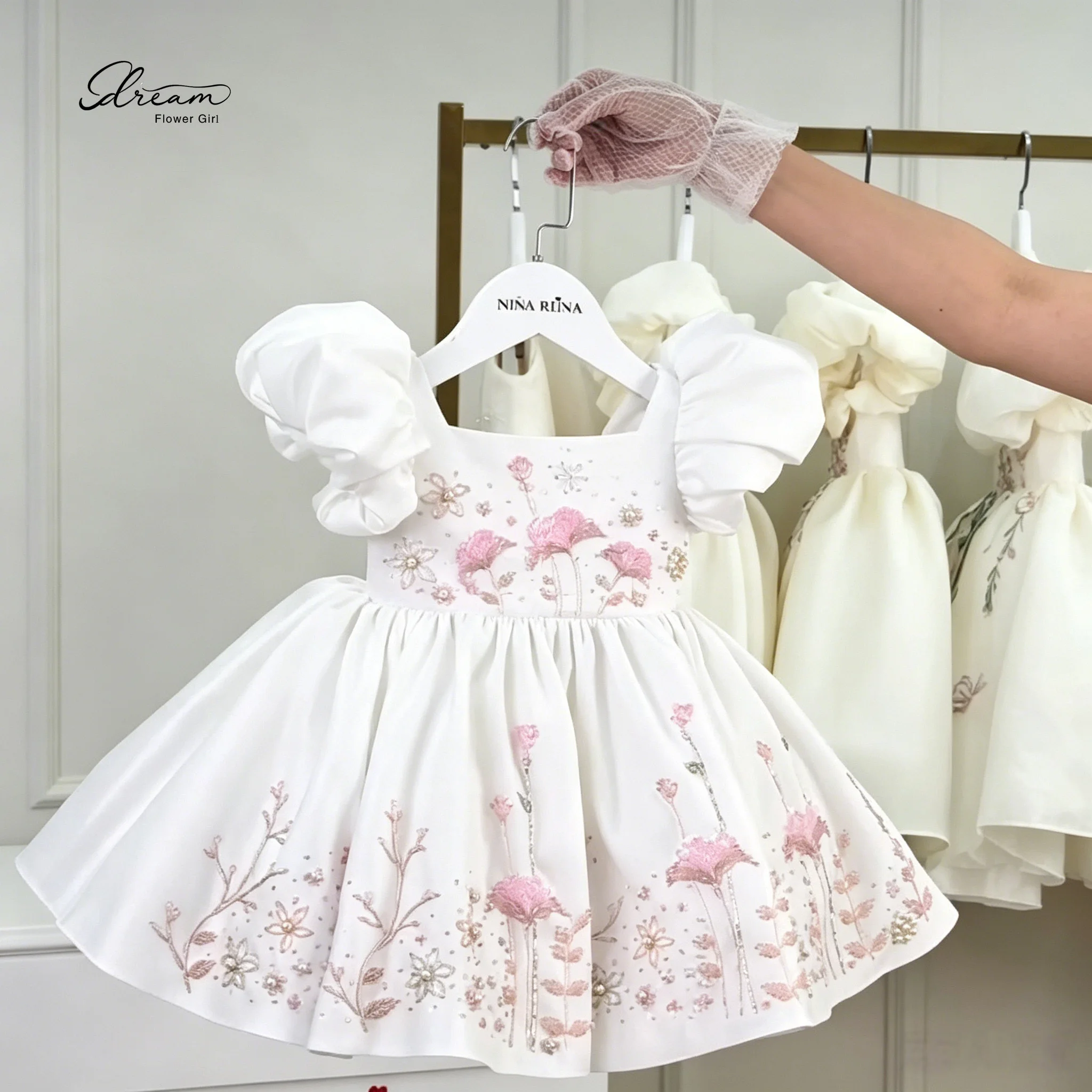 Exquisite white formal dress for girls featuring a princess style puff skirt cape sleeves and floral embroidery