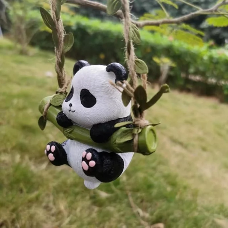 A mini panda figurine, designed specifically for swaying and hanging, perfect for outdoor use. These adorable animal statues can