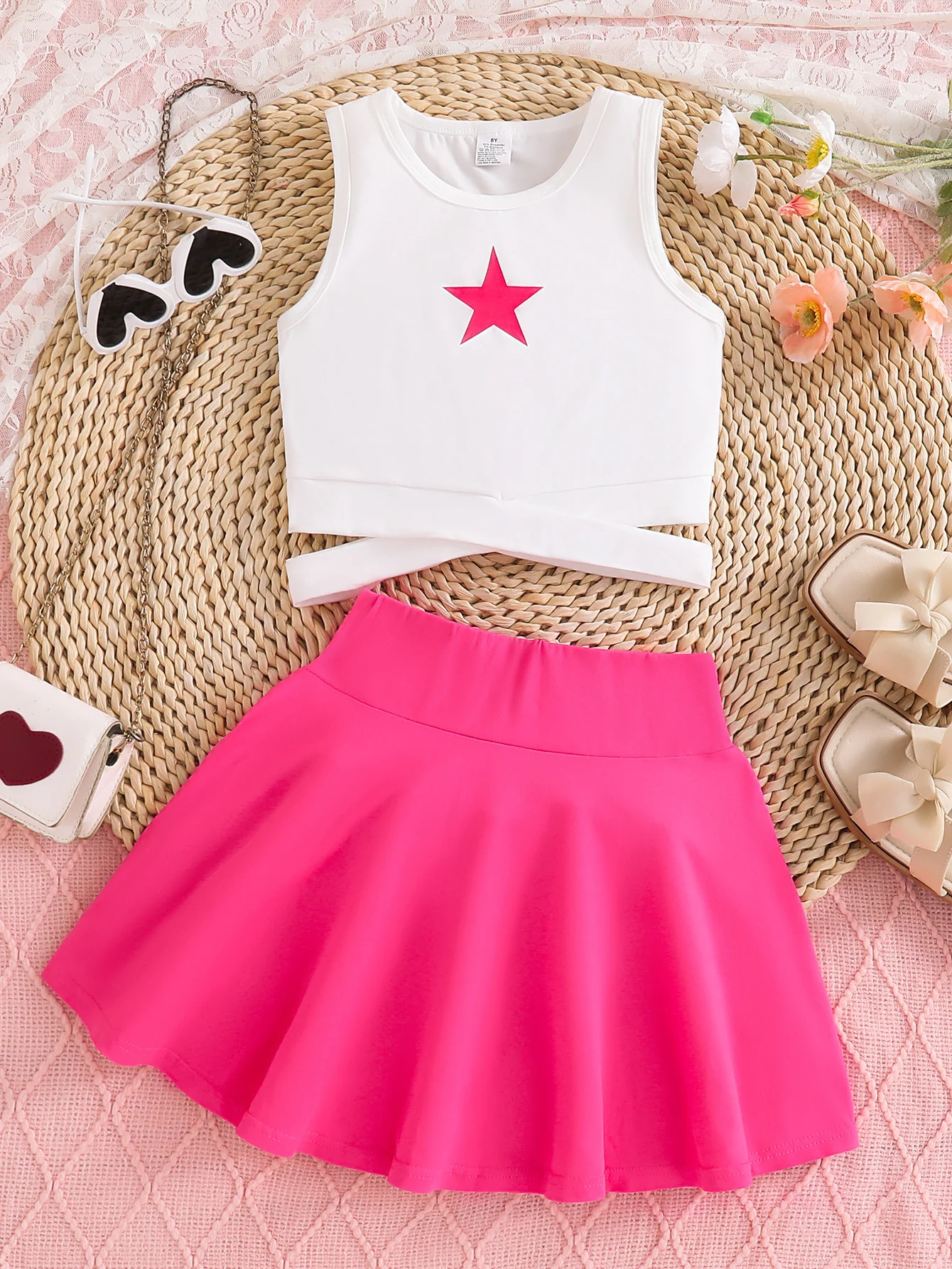 Nuevo conjunto de 2 piezas para niñas: conjunto de falda corta sin mangas delgada de verano, chaleco tipo jersey de cuello redondo con estampado de estrella de cinco puntas simple y cómodo para niños + conjunto de dos piezas de falda de color liso. Ropa d