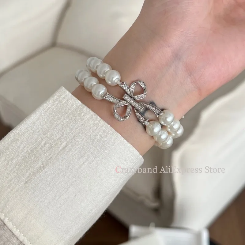 2025 جديد القوس تمتد مطرز حزام ساعة نسائية حزام لساعة أبل 38/40/41/42/44/45/46/49 مللي متر ل Iwatch 9 8 7 6 SE سوار