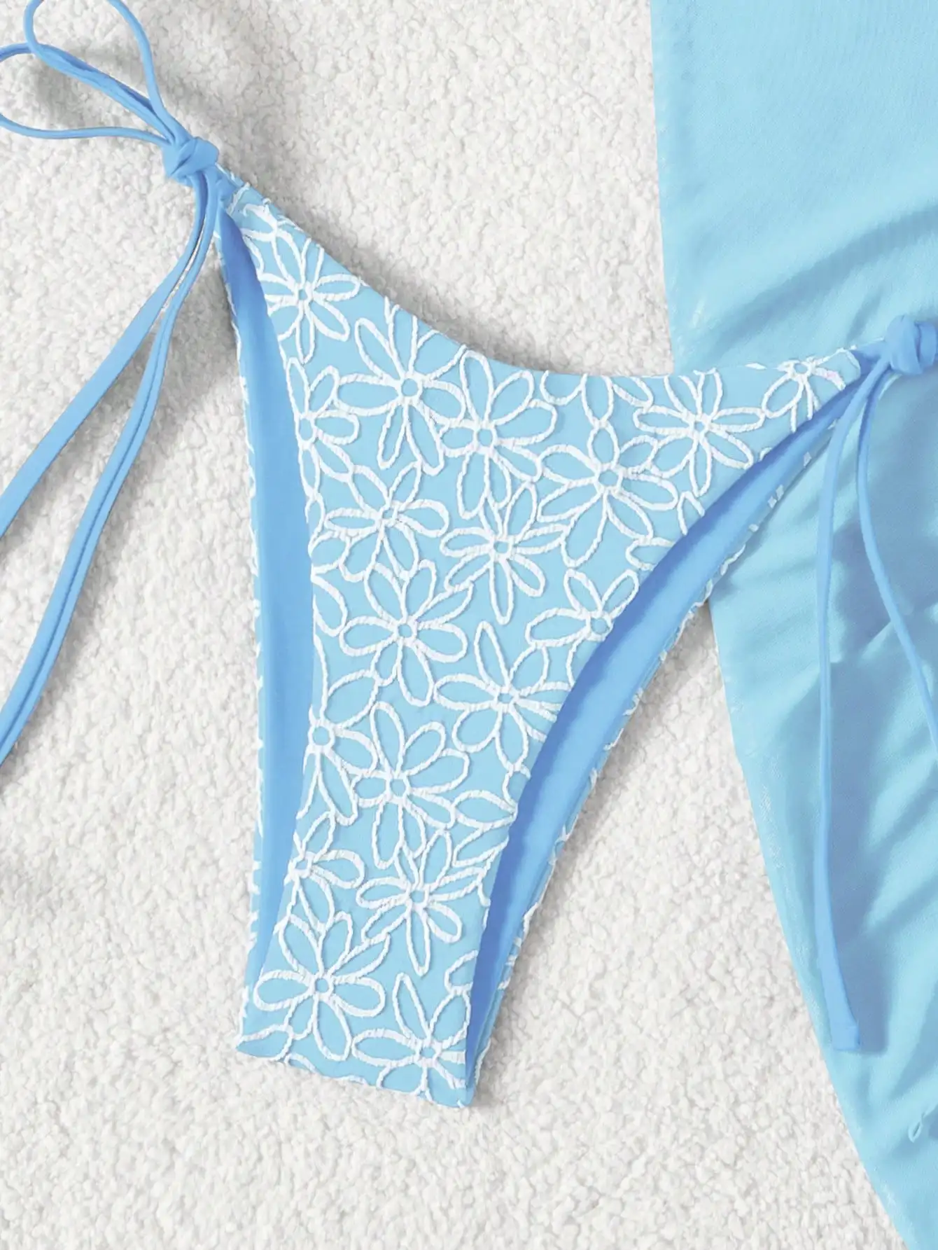 

Light Blue 3-Piece Women’s Beach Set: Floral Embroidered Triangle Top, Side-Tie Bottoms, And Solid Mesh Cover-Up Skirt