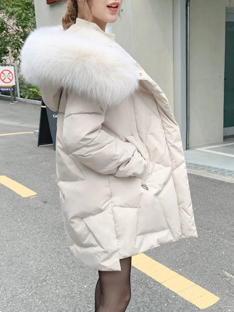 Parkas holgadas coreanas para mujer, chaqueta acolchada de algodón de longitud media con capucha para invierno, abrigo para mujer con cuello de piel sintética, chaqueta gruesa y cálida, novedad de 2025