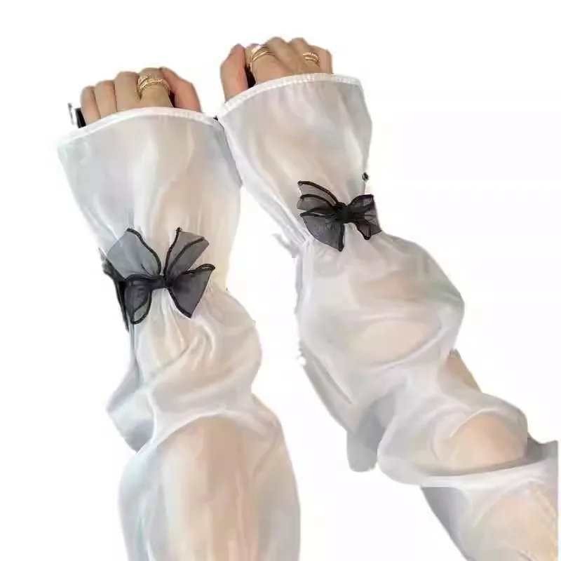 Les manches de protection solaire sont douces et mignonnes avec un nœud papillon unique offrent un look délicat, doux et haut de gamme.