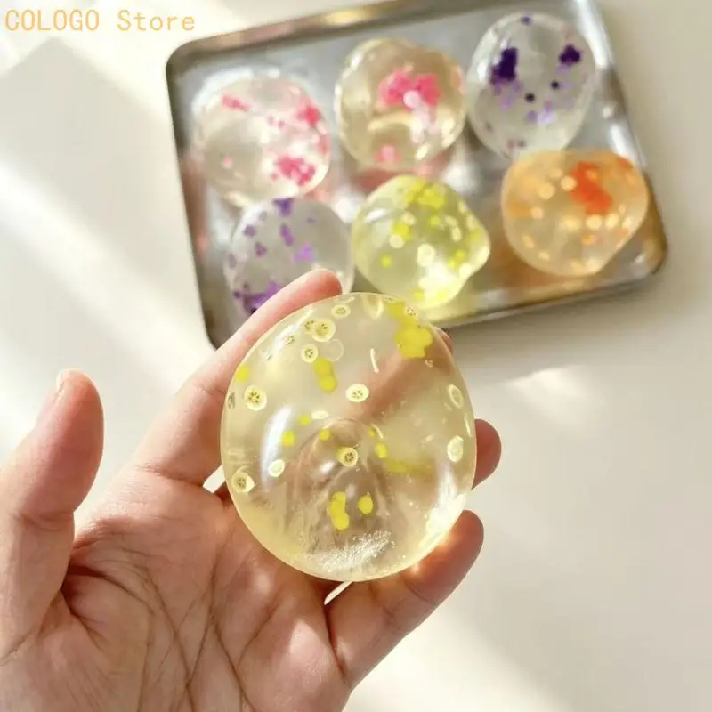 Shelf Display Hand Toy with Clear Body and Flower Inlays Daily D0LD