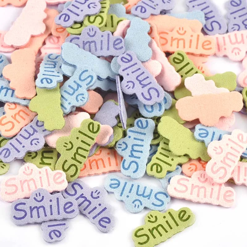 30pcs 14.5x29mm Smile Letter Embossed Leather Labels For Clothes Sewing Accessories DIY Bag Kid Garment Craft Handmade Tag C3707