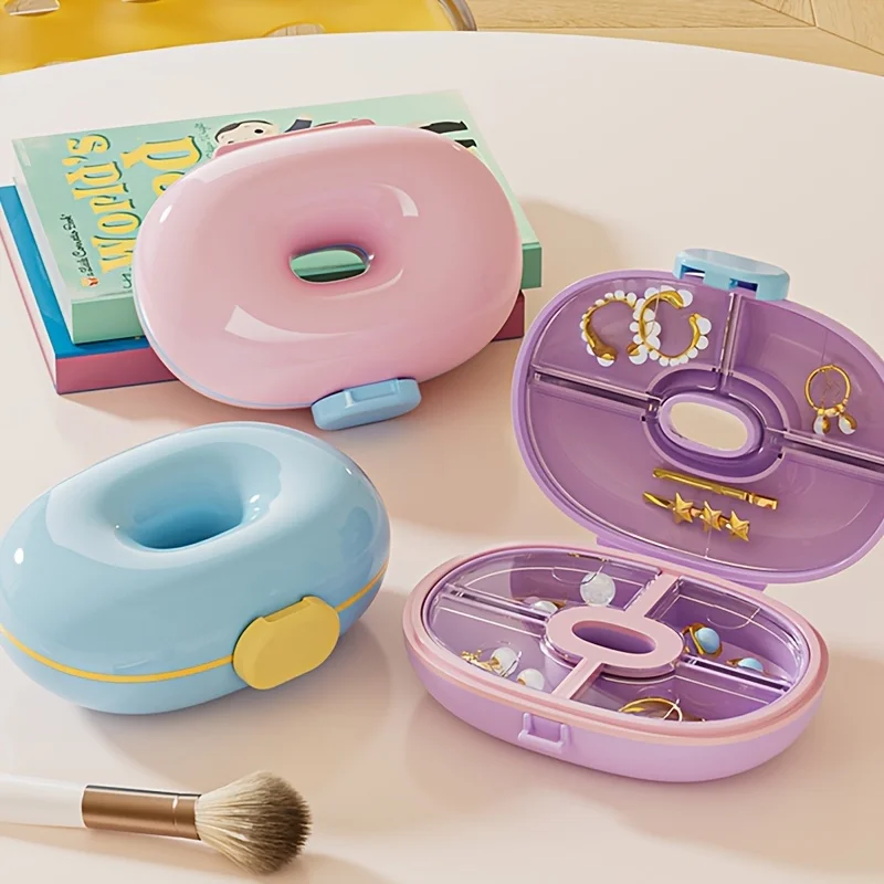 1Pc Donut-Shaped Pill Box in Dopamine Macaron Colors, Creative Design Pill Organizer Travel Pill Box, High-End Exquisite New Small Portable Jewelry Box - Portable Medicine Storage Box with 7 Compartments, Jewelry Storage Box, Compact and Easy to Carry, Perfect for On-The-Go, Dedicated Pill Box for Handbags, Large Capacity Storage Box, Suitable for Vitamins, Earrings, Dustproof and Moisture-Proof, Portable Outdoor Storage Box, Holiday Gift