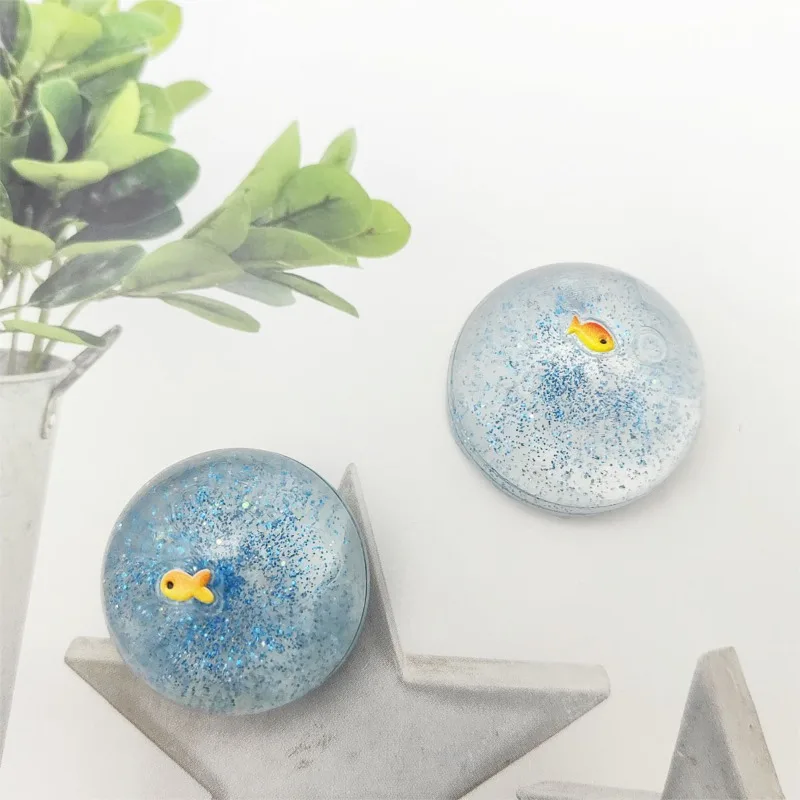 Ocean Planet Squishy Fidget Toy Morbido e carino Piccolo pesce rosso Pizzico Giocattolo di decompressione Pianeta Paillettes Giocattolo anti-ansia per i regali dei bambini