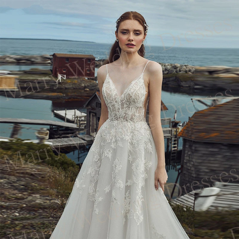 Abiti da sposa bohémien affascinanti a-line Appliques di pizzo abiti da sposa spalline con scollo a v senza maniche abito senza schienale De Mariée