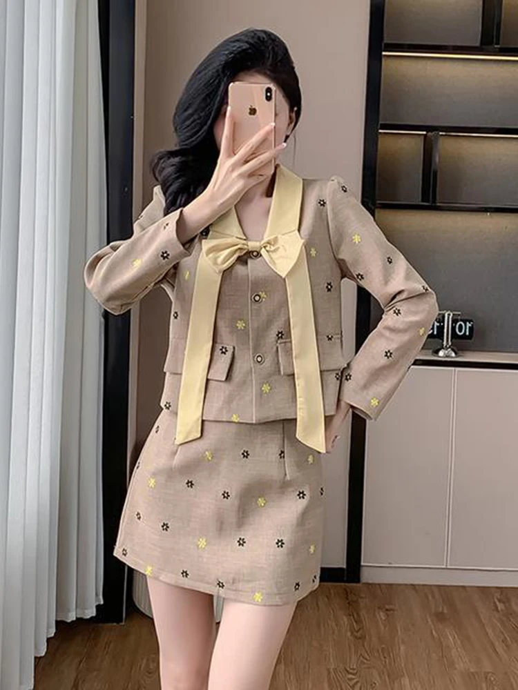 

Темпераментная женская осенняя новая легкая роскошная куртка с длинным рукавом и бантом + утягивающая полуюбка, комплект из двух предметов