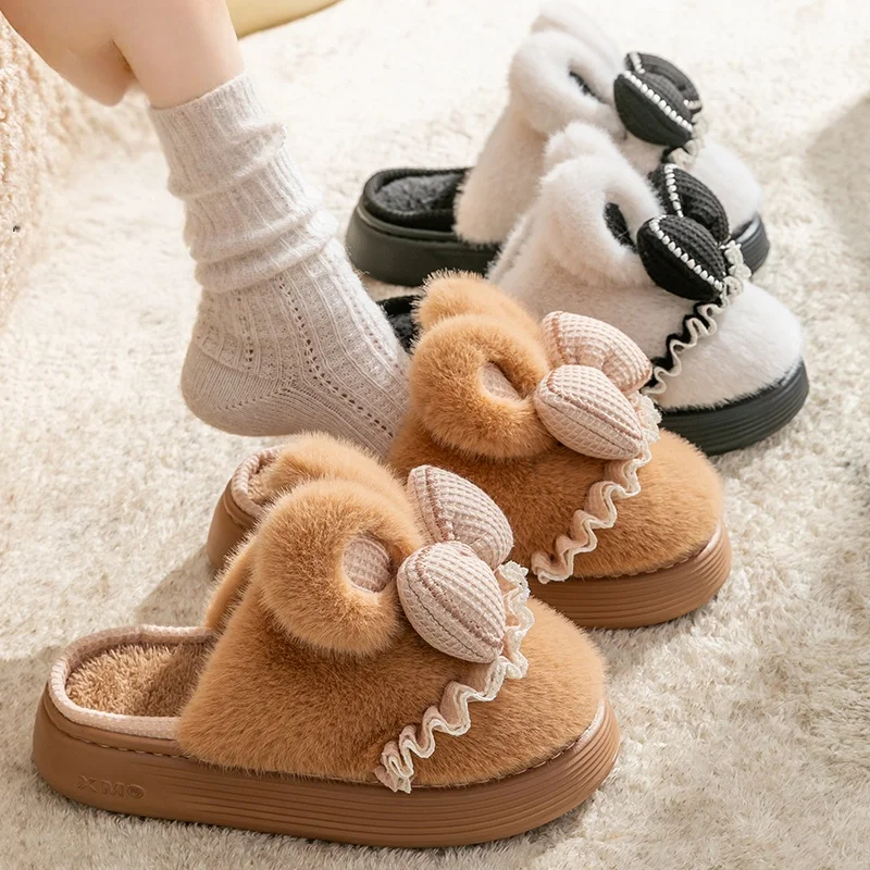 

Winter women's thick plush bow cotton slippers in the home and warm and non-slip cute cotton drag