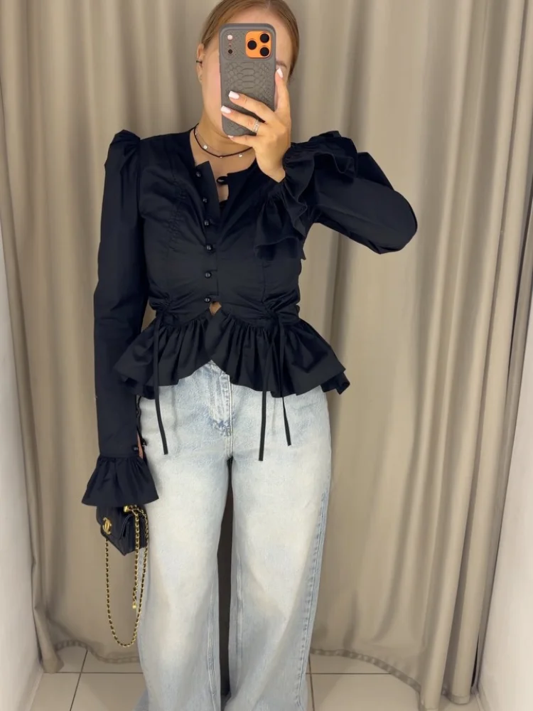 

Универсальная женская укороченная блузка с плиссированными рукавами-фонариками, однотонная, с рюшами, асимметричным подолом, на одной пуговице, с завязками, 2026