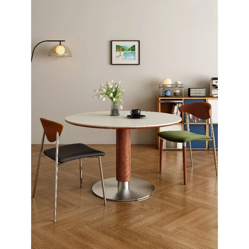 

Medieval dining table Via round table household small apartment designer Bauhaus solid wood leg rock slab dining table