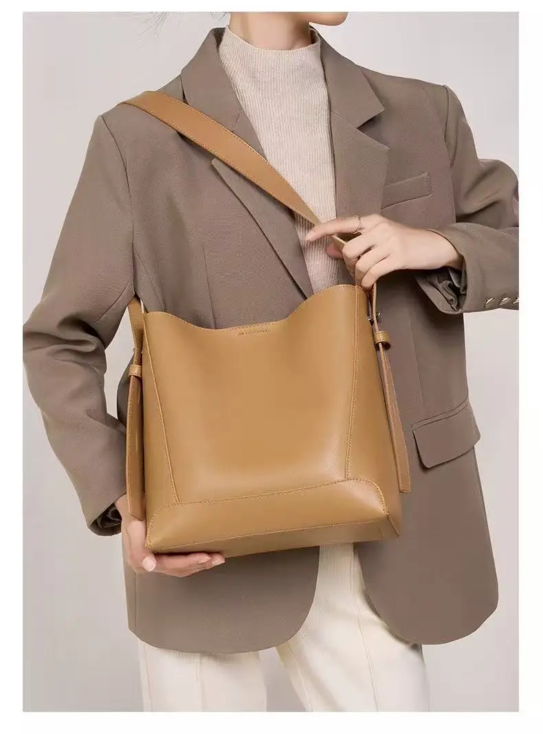 

Premium leather women's bag 2025 new model canvas bucket bag with large capacity and single shoulder strap design
