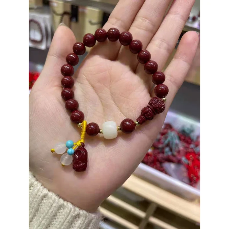 

Xiangxi High-Content Imperial Purple Gold Sand Matching Gourd Amber Tassel Bracelet