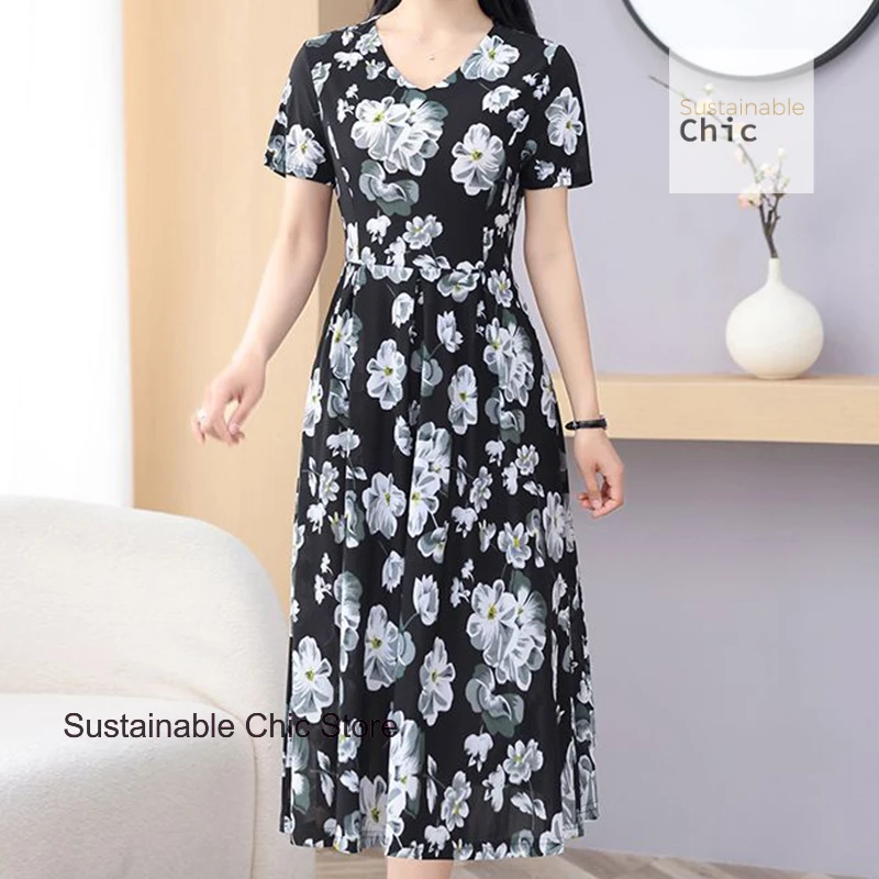 

French fashion short-sleeved dress female summer new temperament new over-the-knee skirt plus size loose elastic floral dress