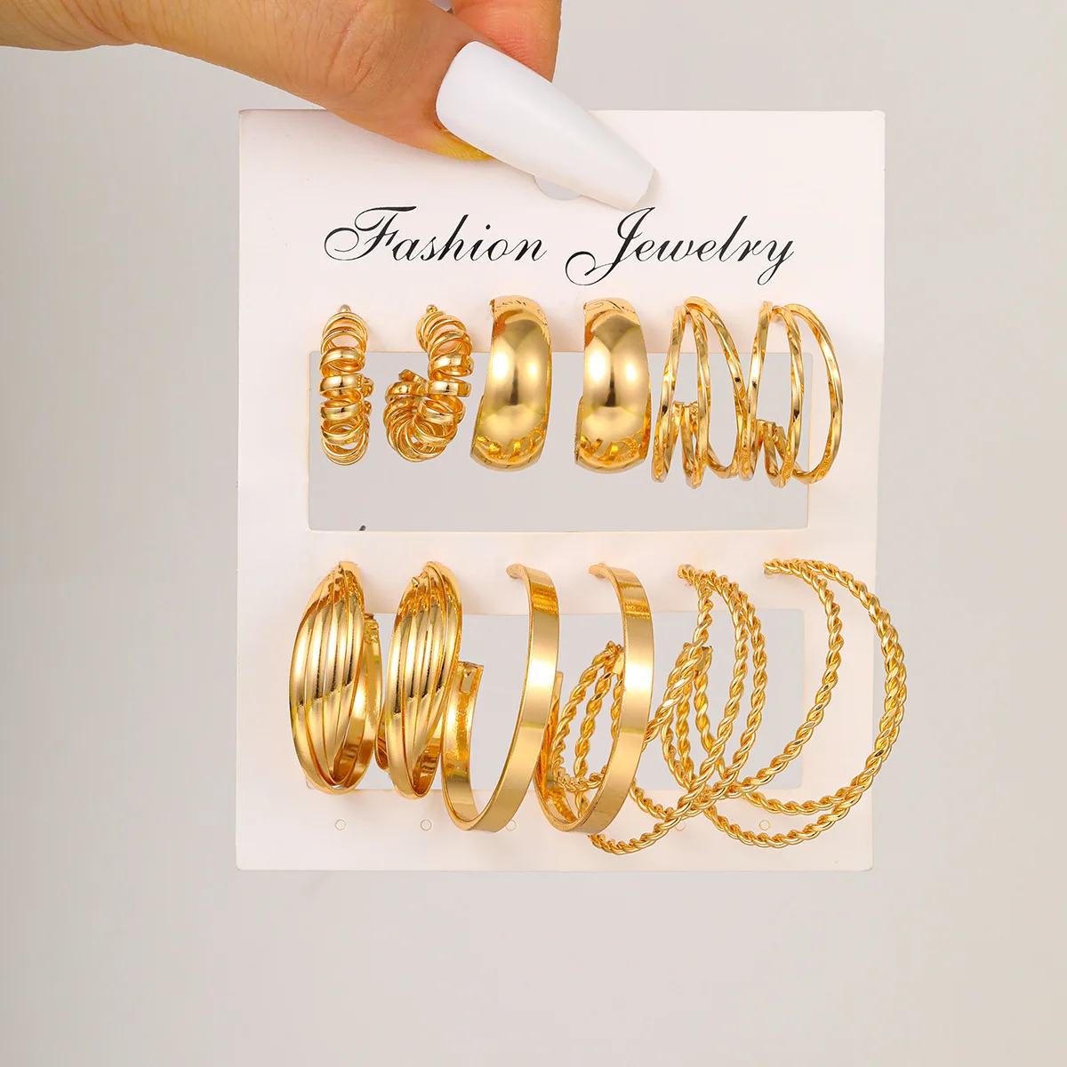 1Set New Personalized Fashionable Geometric C-Type Three Tube Fried Dough Twists Hollow Spiral Alloy Earring Set Six Pairs