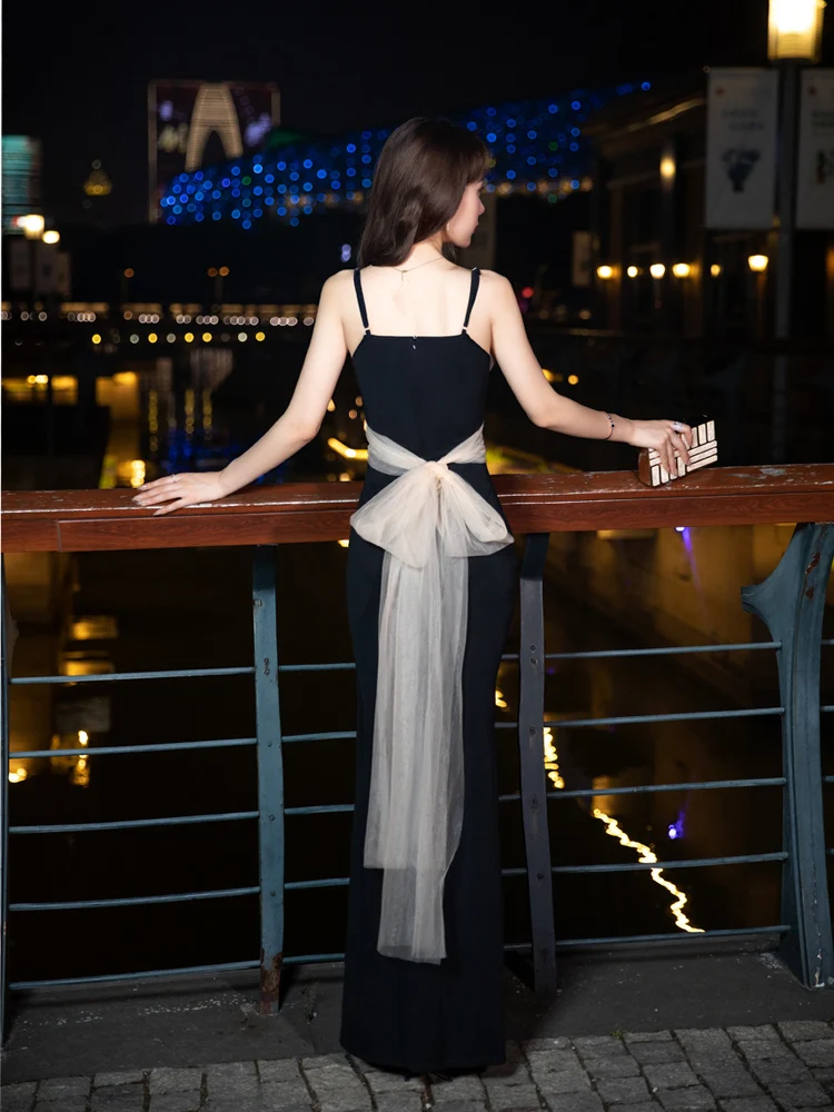 Sexy black evening dress slim fit buttocks wrapped long dress with suspender nightclub light luxury niche high-end fishtail