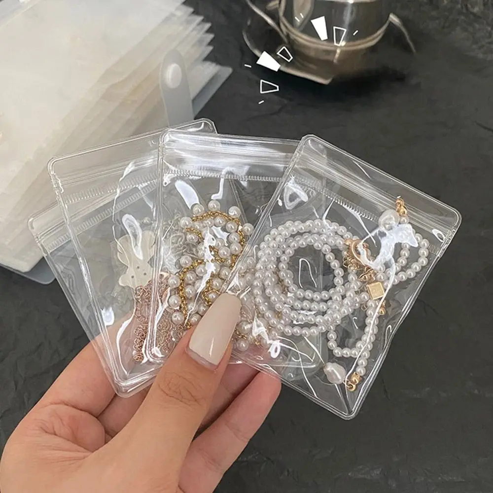 100 Stück staubdichte PVC-selbstdichtende Kunststoff-Schmuck-Druckverschlussbeutel, wiederverschließbar, dick, transparent, Geschenkverpackung, Aufbewahrungsbeutel