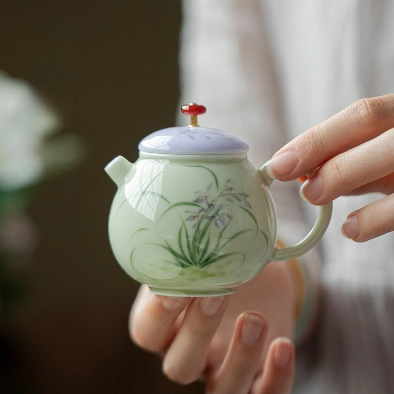 

Подглазурный цвет, чистая ручная роспись, орхидея, чайник, креативный керамический чайник ручной работы