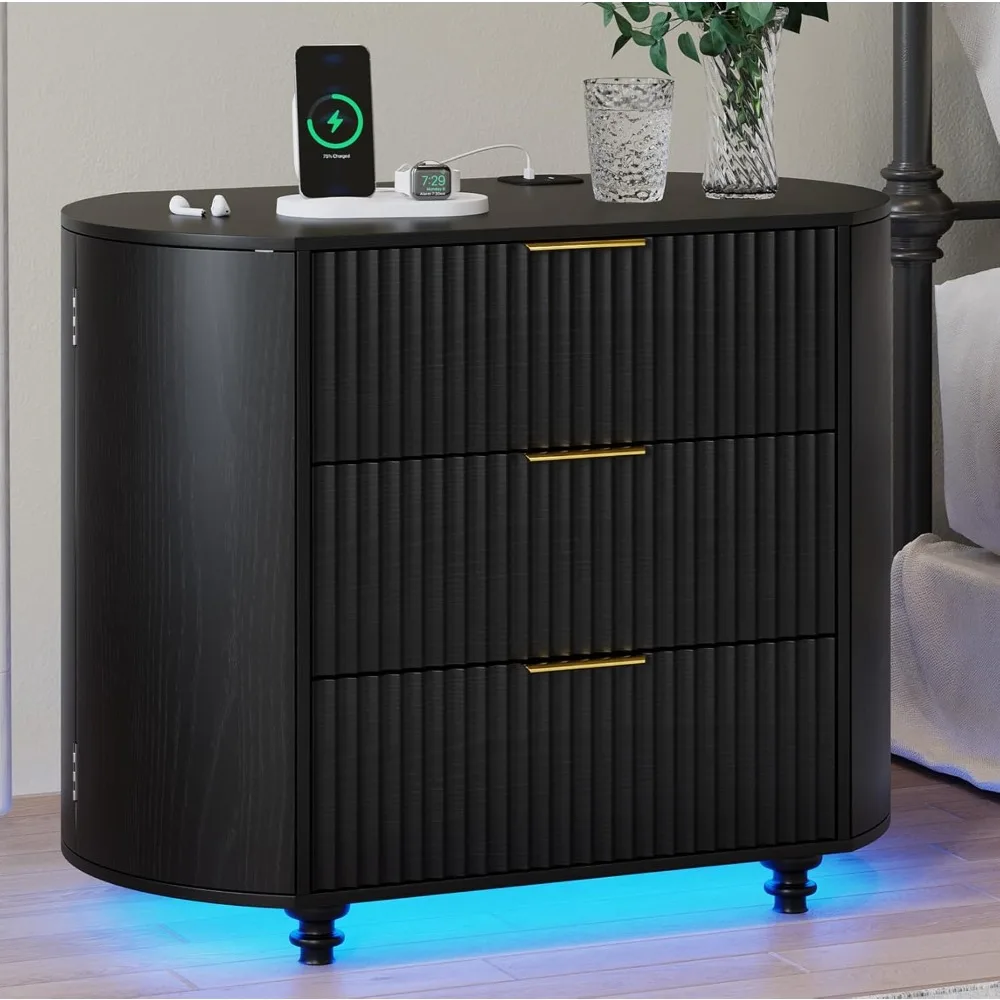 

31.5" Oval Fluted LED Nightstand w/ Charging Station—3 Sliding Drawers, 2 Side Cubbies, Modern Wood Bedside End Table