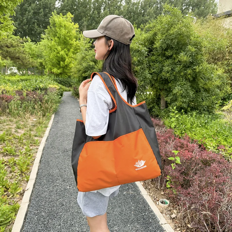 Hand bill of lading shoulder bag, sports travel hand-held, fashionable folding single-shoulder hiking, supermarket shopping bag