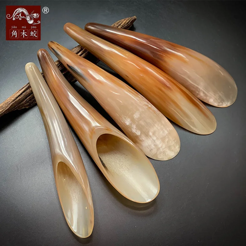 

Long-handled massage beauty stick made from hornwood and yak horn for gua sha therapy